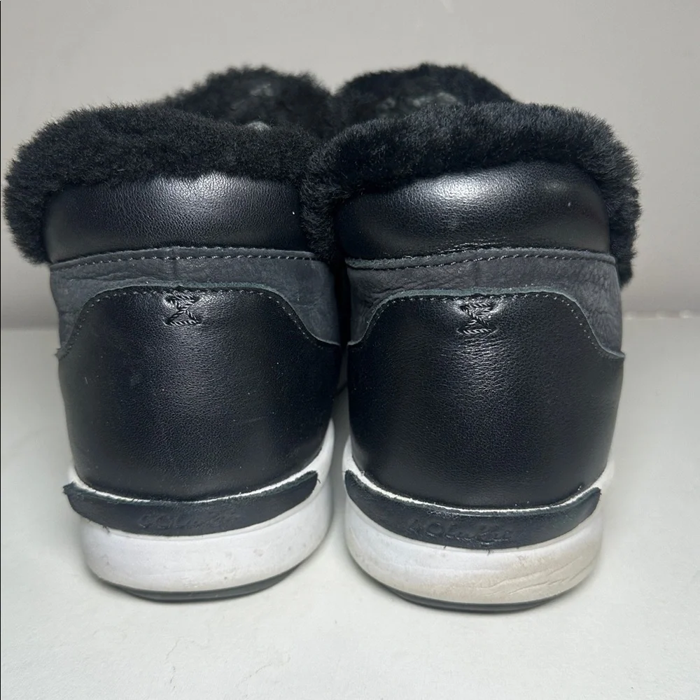 Olukai women’s Black faux fur leather Slip-On booties